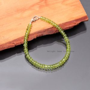 Shop Peridot Bracelets! Glowing Natural Green Peridot Beaded Bracelet-5MM-5.5MM Faceted Rondell Gemstone bracelet-peridot jewelry-birthstone bracelet-Halloween gift | Natural genuine Peridot bracelets. Buy crystal jewelry, handmade handcrafted artisan jewelry for women.  Unique handmade gift ideas. #jewelry #beadedbracelets #beadedjewelry #gift #shopping #handmadejewelry #fashion #style #product #bracelets #affiliate #ad