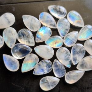 Shop Rainbow Moonstone Cabochons! 14-16mm Rainbow Moonstone Pear Shaped Plain Both Side Flashy Blue/White Smooth Loose Cabochons, 5 Pcs – PKSG149 | Natural genuine stones & crystals in various shapes & sizes. Buy raw cut, tumbled, or polished gemstones for making jewelry or crystal healing energy vibration raising reiki stones. #crystals #gemstones #crystalhealing #crystalsandgemstones #energyhealing #affiliate #ad
