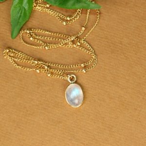 Shop Rainbow Moonstone Jewelry! Moonstone necklace – rainbow moonstone -dew drops – june birthstone – a tiny gold lined moonstone on a 14k gold filled satellite chain | Natural genuine Rainbow Moonstone jewelry. Buy crystal jewelry, handmade handcrafted artisan jewelry for women.  Unique handmade gift ideas. #jewelry #beadedjewelry #beadedjewelry #gift #shopping #handmadejewelry #fashion #style #product #jewelry #affiliate #ad