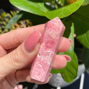 Shop Rhodochrosite Stones & Crystals! Rhodochrosite tower | Natural genuine stones & crystals in various shapes & sizes. Buy raw cut, tumbled, or polished gemstones for making jewelry or crystal healing energy vibration raising reiki stones. #crystals #gemstones #crystalhealing #crystalsandgemstones #energyhealing #affiliate #ad