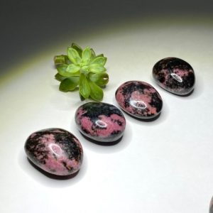 Shop Rhodonite Stones & Crystals! Pink Rhodonite Palm Stone | Natural genuine stones & crystals in various shapes & sizes. Buy raw cut, tumbled, or polished gemstones for making jewelry or crystal healing energy vibration raising reiki stones. #crystals #gemstones #crystalhealing #crystalsandgemstones #energyhealing #affiliate #ad