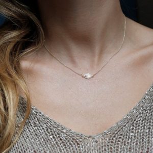 Shop Ruby Necklaces! Hamsa necklace, Gold diamond hand, Tiny ruby protection charm, Sideways pendant | Natural genuine Ruby necklaces. Buy crystal jewelry, handmade handcrafted artisan jewelry for women.  Unique handmade gift ideas. #jewelry #beadednecklaces #beadedjewelry #gift #shopping #handmadejewelry #fashion #style #product #necklaces #affiliate #ad