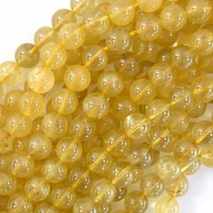 Shop Rutilated Quartz Round Beads! Natural Gold Rutilated Quartz Round Beads Gemstone 15" Strand 4mm 6mm 8mm 10mm | Natural genuine round Rutilated Quartz beads for beading and jewelry making.  #jewelry #beads #beadedjewelry #diyjewelry #jewelrymaking #beadstore #beading #affiliate #ad