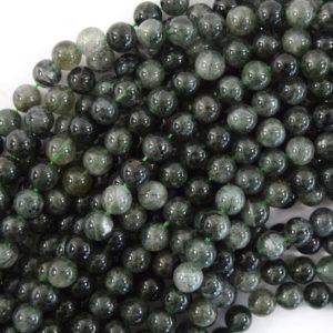 Shop Rutilated Quartz Round Beads! Natural Green Rutilated Quartz Round Beads 15.5" Strand 4mm 6mm 8mm 10mm | Natural genuine round Rutilated Quartz beads for beading and jewelry making.  #jewelry #beads #beadedjewelry #diyjewelry #jewelrymaking #beadstore #beading #affiliate #ad