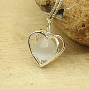 Shop Selenite Pendants! Minimalist Selenite heart Pendant necklace. Crystal Reiki jewelry uk. Sterling silver necklace. Wire wrap pendant | Natural genuine Selenite pendants. Buy crystal jewelry, handmade handcrafted artisan jewelry for women.  Unique handmade gift ideas. #jewelry #beadedpendants #beadedjewelry #gift #shopping #handmadejewelry #fashion #style #product #pendants #affiliate #ad