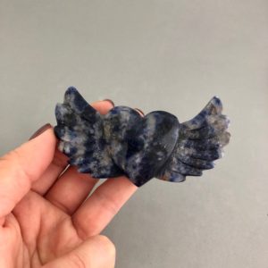 Shop Sodalite Shapes! One Dark Blue Sodalite Heart with Wings Carving | Natural genuine stones & crystals in various shapes & sizes. Buy raw cut, tumbled, or polished gemstones for making jewelry or crystal healing energy vibration raising reiki stones. #crystals #gemstones #crystalhealing #crystalsandgemstones #energyhealing #affiliate #ad