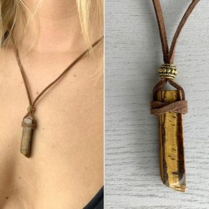 Shop Tiger Eye Pendants! Tigers Eye Crystal Point Protection Pendant Necklace on Vegan Friendly Cord, Black Cord Crystal Necklace, Gift for Him, Tigers Eye Necklace | Natural genuine Tiger Eye pendants. Buy crystal jewelry, handmade handcrafted artisan jewelry for women.  Unique handmade gift ideas. #jewelry #beadedpendants #beadedjewelry #gift #shopping #handmadejewelry #fashion #style #product #pendants #affiliate #ad