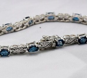 Shop Topaz Bracelets! Bracelet, London Blue Topaz, Genuine Gemstones, Twelve 6×4 mm Faceted Oval Gemstones, Set in 925 Sterling Silver with Double Clip Box Clasp | Natural genuine Topaz bracelets. Buy crystal jewelry, handmade handcrafted artisan jewelry for women.  Unique handmade gift ideas. #jewelry #beadedbracelets #beadedjewelry #gift #shopping #handmadejewelry #fashion #style #product #bracelets #affiliate #ad