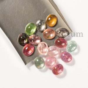 Shop Tourmaline Cabochons! 5 Pc Lot, Tourmaline Oval Calibrated Gemstone, A Quality Multi Tourmaline Cabochon, 9x11mm Smooth Tourmaline Cabs, Loose Tourmaline Gemstone | Natural genuine stones & crystals in various shapes & sizes. Buy raw cut, tumbled, or polished gemstones for making jewelry or crystal healing energy vibration raising reiki stones. #crystals #gemstones #crystalhealing #crystalsandgemstones #energyhealing #affiliate #ad