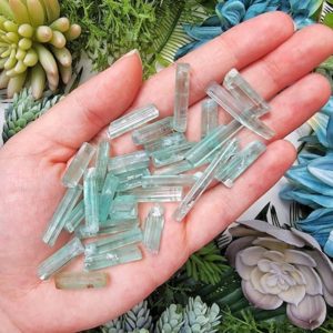 Shop Tourmaline Stones & Crystals! One Raw Blue Tourmaline Chip | Blue Tourmaline – No. 80 | Natural genuine stones & crystals in various shapes & sizes. Buy raw cut, tumbled, or polished gemstones for making jewelry or crystal healing energy vibration raising reiki stones. #crystals #gemstones #crystalhealing #crystalsandgemstones #energyhealing #affiliate #ad