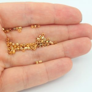 Shop Crimp Beads! 50Pcs 2X1,5MM 24K Shiny Gold Crimp Beads, Crimp Tube, Tiny Crimps, Gold Plated Jewelry Findings, Stopper Beads, Gold Plated Supplies, FND020 | Shop jewelry making and beading supplies, tools & findings for DIY jewelry making and crafts. #jewelrymaking #diyjewelry #jewelrycrafts #jewelrysupplies #beading #affiliate #ad