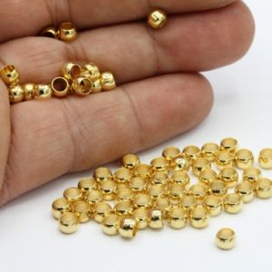 Shop Crimp Beads! 5mm 24 k Shiny Gold Plated Crimp Beads – GLD43 | Shop jewelry making and beading supplies, tools & findings for DIY jewelry making and crafts. #jewelrymaking #diyjewelry #jewelrycrafts #jewelrysupplies #beading #affiliate #ad