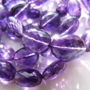 Shop Amethyst Beads! Amethyst Oval Nuggets • AA+ Micro Faceted Beads • Genuine Natural African Gemstone • Deep Purple • Some Inclusions Zoning Banding | Natural genuine beads Amethyst beads for beading and jewelry making.  #jewelry #beads #beadedjewelry #diyjewelry #jewelrymaking #beadstore #beading #affiliate #ad