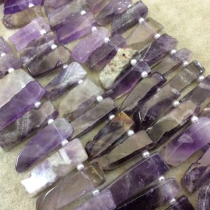 Graduated Strand of Mixed Amethyst Stick Beads – 15" Strand (Approximately 37 Beads) – Measuring 12mm x 40mm Long – Natural Gemstone | Natural genuine other-shape Gemstone beads for beading and jewelry making.  #jewelry #beads #beadedjewelry #diyjewelry #jewelrymaking #beadstore #beading #affiliate #ad