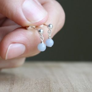Shop Angelite Jewelry! Angelite Stud Earrings . Natural Stone Earrings Dangle . Small Gemstone Earrings Studs | Natural genuine Angelite jewelry. Buy crystal jewelry, handmade handcrafted artisan jewelry for women.  Unique handmade gift ideas. #jewelry #beadedjewelry #beadedjewelry #gift #shopping #handmadejewelry #fashion #style #product #jewelry #affiliate #ad