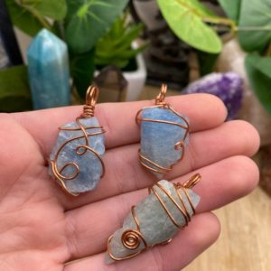 Shop Raw & Rough Aquamarine Stones! Raw Aquamarine wire wrapped pendant | Natural genuine stones & crystals in various shapes & sizes. Buy raw cut, tumbled, or polished gemstones for making jewelry or crystal healing energy vibration raising reiki stones. #crystals #gemstones #crystalhealing #crystalsandgemstones #energyhealing #affiliate #ad