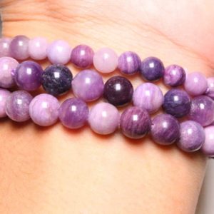 Bracelet Sugilite AAA in natural pearls 6/8 mm 18-19 cm smooth semi-precious stone and round jewelry natural stone | Natural genuine Sugilite bracelets. Buy crystal jewelry, handmade handcrafted artisan jewelry for women.  Unique handmade gift ideas. #jewelry #beadedbracelets #beadedjewelry #gift #shopping #handmadejewelry #fashion #style #product #bracelets #affiliate #ad
