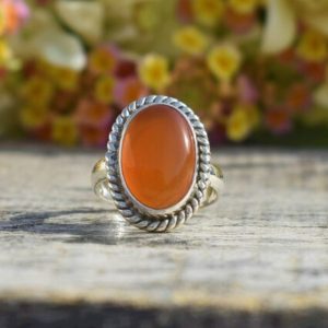 Shop Carnelian Rings! Orange Carnelian Ring, 925 Sterling Silver Ring, Oval Gemstone Ring, Single Band Ring, Gift For Mom Sis, Orange Gemstone Ring, Sale, Twisted | Natural genuine Carnelian rings, simple unique handcrafted gemstone rings. #rings #jewelry #shopping #gift #handmade #fashion #style #affiliate #ad