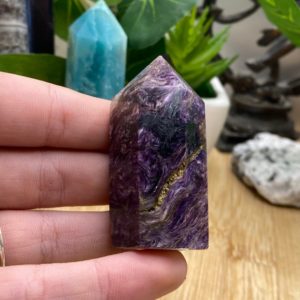 Shop Charoite Stones & Crystals! Polished Charoite tower point MCHT4 Flat 16 | Natural genuine stones & crystals in various shapes & sizes. Buy raw cut, tumbled, or polished gemstones for making jewelry or crystal healing energy vibration raising reiki stones. #crystals #gemstones #crystalhealing #crystalsandgemstones #energyhealing #affiliate #ad