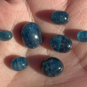 Shop Kyanite Cabochons! Set of 7 Blue Kyanite Cabochons, Oval Cabochon Lot, Sheen, Ring Size, Small Pendant Cabs, Accent Stones, Gemmy Kyanite Cabs, High Quality | Natural genuine stones & crystals in various shapes & sizes. Buy raw cut, tumbled, or polished gemstones for making jewelry or crystal healing energy vibration raising reiki stones. #crystals #gemstones #crystalhealing #crystalsandgemstones #energyhealing #affiliate #ad