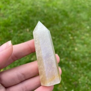 Shop Moonstone Points & Wands! Blue Moonstone tower point obelisk MMST1 Flat 15 | Natural genuine stones & crystals in various shapes & sizes. Buy raw cut, tumbled, or polished gemstones for making jewelry or crystal healing energy vibration raising reiki stones. #crystals #gemstones #crystalhealing #crystalsandgemstones #energyhealing #affiliate #ad