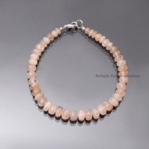 Shop Morganite Bracelets! Peach Pink Morganite Smooth Rondelle Beaded Bracelet, 5mm-8mm Morganite Gemstone Beads Bracelet, Morganite Jewelry, Bracelet For Gift Her | Natural genuine Morganite bracelets. Buy crystal jewelry, handmade handcrafted artisan jewelry for women.  Unique handmade gift ideas. #jewelry #beadedbracelets #beadedjewelry #gift #shopping #handmadejewelry #fashion #style #product #bracelets #affiliate #ad
