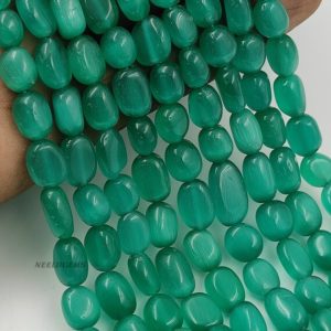 Shop Onyx Bead Shapes! Beautiful Green Chalcedony Monalisa Smooth Ovals Shape Beads,Chalcedony Monalisa Oval Bead,Green Smooth Ovals,Monalisa Strand,Monalisa Beads | Natural genuine other-shape Onyx beads for beading and jewelry making.  #jewelry #beads #beadedjewelry #diyjewelry #jewelrymaking #beadstore #beading #affiliate #ad