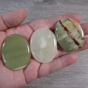 Shop Onyx Stones & Crystals! Green Onyx Flat Oval Palm Stone Small E11 a | Natural genuine stones & crystals in various shapes & sizes. Buy raw cut, tumbled, or polished gemstones for making jewelry or crystal healing energy vibration raising reiki stones. #crystals #gemstones #crystalhealing #crystalsandgemstones #energyhealing #affiliate #ad