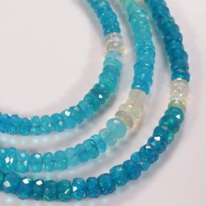 Shop Opal Beads! Paraiba Opal Beads, Ethiopian Opal Beads, Blue Opal Rondelle Beads, Opal Faceted Beads, Flashy Opal Gemstone Bead, Opal Jewelry Making Beads | Natural genuine beads Opal beads for beading and jewelry making.  #jewelry #beads #beadedjewelry #diyjewelry #jewelrymaking #beadstore #beading #affiliate #ad