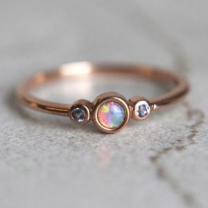 Shop Opal Rings! Fire Opal Ring, Three Stone Engagement Ring,  Round Opal Ring, Dainty Opal Ring, October Birthday, Gift for Her | Natural genuine Opal rings, simple unique alternative gemstone engagement rings. #rings #jewelry #bridal #wedding #jewelryaccessories #engagementrings #weddingideas #affiliate #ad