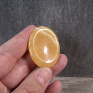 Shop Orange Calcite Shapes! Orange Calcite Worry Stone E26 | Natural genuine stones & crystals in various shapes & sizes. Buy raw cut, tumbled, or polished gemstones for making jewelry or crystal healing energy vibration raising reiki stones. #crystals #gemstones #crystalhealing #crystalsandgemstones #energyhealing #affiliate #ad
