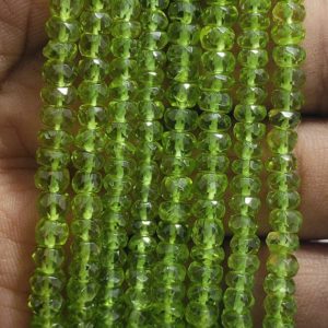 Shop Peridot Faceted Beads! AAA+ Natural Green Peridot Faceted Rondelle Shape Gemstone Beads,Geniune Green Peridot Beads,4-5 MM Green Peridot Beads For Handmade Jewelry | Natural genuine faceted Peridot beads for beading and jewelry making.  #jewelry #beads #beadedjewelry #diyjewelry #jewelrymaking #beadstore #beading #affiliate #ad
