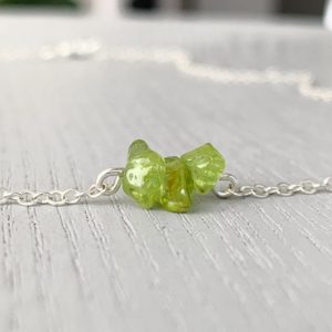 Shop Peridot Necklaces! RAW PERIDOT NECKLACE August Birthstone Necklace for Her, Dainty Green Gemstone Necklace, Tiny Green Crystal Necklace for August Birthdays | Natural genuine Peridot necklaces. Buy crystal jewelry, handmade handcrafted artisan jewelry for women.  Unique handmade gift ideas. #jewelry #beadednecklaces #beadedjewelry #gift #shopping #handmadejewelry #fashion #style #product #necklaces #affiliate #ad