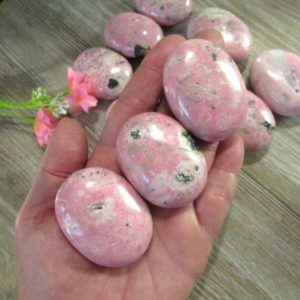 Shop Rhodonite Shapes! Rhodonite – Choose One Palm Stone – Grade A Rhodonite – ITEM# RPS1x | Natural genuine stones & crystals in various shapes & sizes. Buy raw cut, tumbled, or polished gemstones for making jewelry or crystal healing energy vibration raising reiki stones. #crystals #gemstones #crystalhealing #crystalsandgemstones #energyhealing #affiliate #ad