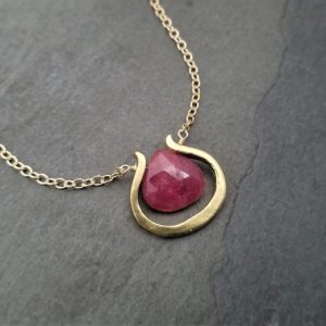 Shop Ruby Pendants! Raw Ruby Necklace, Rosy Red Gemstone, Framed Faceted Briolette Pendant, Genuine Ruby Gold Handmade Necklace, Unique Freeform Element | Natural genuine Ruby pendants. Buy crystal jewelry, handmade handcrafted artisan jewelry for women.  Unique handmade gift ideas. #jewelry #beadedpendants #beadedjewelry #gift #shopping #handmadejewelry #fashion #style #product #pendants #affiliate #ad