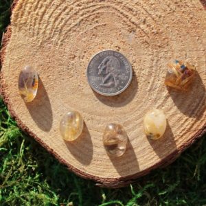 Shop Rutilated Quartz Cabochons! Rutilated Quartz Cabochon Set 1 #F-J | Natural genuine stones & crystals in various shapes & sizes. Buy raw cut, tumbled, or polished gemstones for making jewelry or crystal healing energy vibration raising reiki stones. #crystals #gemstones #crystalhealing #crystalsandgemstones #energyhealing #affiliate #ad