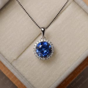 Shop Sapphire Necklaces! Blue sapphire pendent,sapphire necklace,round cut engagement necklace,September birthstone | Natural genuine Sapphire necklaces. Buy handcrafted artisan wedding jewelry.  Unique handmade bridal jewelry gift ideas. #jewelry #beadednecklaces #gift #crystaljewelry #shopping #handmadejewelry #wedding #bridal #necklaces #affiliate #ad