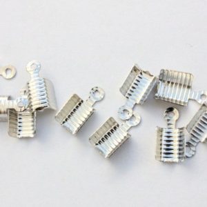 Shop Cord Tips! Silver Cord Tips, Brass, Nickel Free, Platinum Color Ribbon Ends 5mm wide, 13mm long, 1.3mm hole 50 Pieces Silver Cord End Tips | Shop jewelry making and beading supplies, tools & findings for DIY jewelry making and crafts. #jewelrymaking #diyjewelry #jewelrycrafts #jewelrysupplies #beading #affiliate #ad
