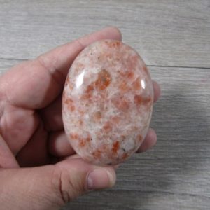 Sunstone Oval Palm Stone E53 B | Natural genuine stones & crystals in various shapes & sizes. Buy raw cut, tumbled, or polished gemstones for making jewelry or crystal healing energy vibration raising reiki stones. #crystals #gemstones #crystalhealing #crystalsandgemstones #energyhealing #affiliate #ad