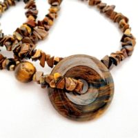 Tiger Eye Protective Circle Talisman Pendant Necklace. Shimmering Golden Brown Gemstones. Long Bold Statement Jewelry | Natural genuine Gemstone jewelry. Buy crystal jewelry, handmade handcrafted artisan jewelry for women.  Unique handmade gift ideas. #jewelry #beadedjewelry #beadedjewelry #gift #shopping #handmadejewelry #fashion #style #product #jewelry #affiliate #ad