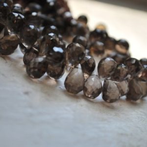 Shop Topaz Bead Shapes! 1/2 strand of smoky topaz tear drops WHOLESALE PRICE 25.00 | Natural genuine other-shape Topaz beads for beading and jewelry making.  #jewelry #beads #beadedjewelry #diyjewelry #jewelrymaking #beadstore #beading #affiliate #ad