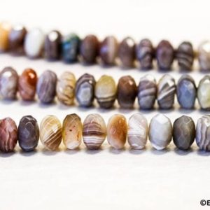 Shop Agate Faceted Beads! M/ Botswana Agate 10mm Faceted Rondelle beads Genuine striped agate Organic color tone banded agate. 15.5 inches long | Natural genuine faceted Agate beads for beading and jewelry making.  #jewelry #beads #beadedjewelry #diyjewelry #jewelrymaking #beadstore #beading #affiliate #ad