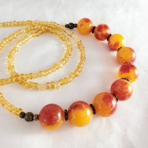 Shop Agate Necklaces! Simple, long layering necklace with agate spheres. Yellow, orange & red swirled gemstones, beige, gold and bronze accents. | Natural genuine Agate necklaces. Buy crystal jewelry, handmade handcrafted artisan jewelry for women.  Unique handmade gift ideas. #jewelry #beadednecklaces #beadedjewelry #gift #shopping #handmadejewelry #fashion #style #product #necklaces #affiliate #ad