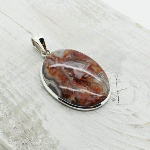 Shop Crazy Lace Agate Jewelry! Crazy lace Agate stone pendant,crazy lace stone jewelry,laguna lace agate big agate stone pendant sterling silver and agate stone jewelry | Natural genuine Agate jewelry. Buy crystal jewelry, handmade handcrafted artisan jewelry for women.  Unique handmade gift ideas. #jewelry #beadedjewelry #beadedjewelry #gift #shopping #handmadejewelry #fashion #style #product #jewelry #affiliate #ad