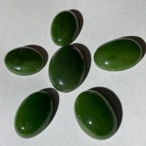 Shop Jade Cabochons! Beautiful British Columbia Jade Cabochons (vintage) | Natural genuine stones & crystals in various shapes & sizes. Buy raw cut, tumbled, or polished gemstones for making jewelry or crystal healing energy vibration raising reiki stones. #crystals #gemstones #crystalhealing #crystalsandgemstones #energyhealing #affiliate #ad