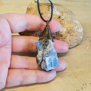 Shop Blue Calcite Jewelry! Mens Raw Blue calcite pendant. Unisex raw crystal necklace. Reiki jewelry uk. Wire wrapped pendant | Natural genuine Blue Calcite jewelry. Buy handcrafted artisan men's jewelry, gifts for men.  Unique handmade mens fashion accessories. #jewelry #beadedjewelry #beadedjewelry #shopping #gift #handmadejewelry #jewelry #affiliate #ad
