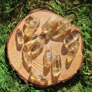 Shop Tumbled Citrine Crystals & Pocket Stones! Natural African Citrine Points Tumbled | Natural genuine stones & crystals in various shapes & sizes. Buy raw cut, tumbled, or polished gemstones for making jewelry or crystal healing energy vibration raising reiki stones. #crystals #gemstones #crystalhealing #crystalsandgemstones #energyhealing #affiliate #ad