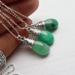 Shop Emerald Pendants! Rough Emerald Necklace with Sterling silver / Beautiful May birthday gift or Christmas gift for her / Green Emerald pendant | Natural genuine Emerald pendants. Buy crystal jewelry, handmade handcrafted artisan jewelry for women.  Unique handmade gift ideas. #jewelry #beadedpendants #beadedjewelry #gift #shopping #handmadejewelry #fashion #style #product #pendants #affiliate #ad