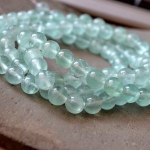 Shop Fluorite Round Beads! Natural Green Fluorite Bead Bulk Wholesale 6mm 8mm Round Fluorite Crystal Beads Bracelet Bead Necklace Beads For Jewelry Making 3550 | Natural genuine round Fluorite beads for beading and jewelry making.  #jewelry #beads #beadedjewelry #diyjewelry #jewelrymaking #beadstore #beading #affiliate #ad