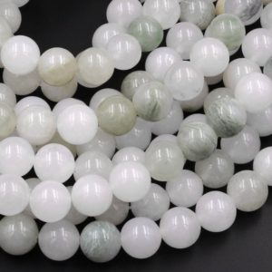 Shop Jade Beads! Natural Ice Mountain Jade 6mm 8mm Smooth Round Beads Real Genuine Natural Green Jade 15.5" Strand | Natural genuine beads Jade beads for beading and jewelry making.  #jewelry #beads #beadedjewelry #diyjewelry #jewelrymaking #beadstore #beading #affiliate #ad